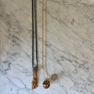 Two necklaces, one Tory Burch, gold and mixed metal